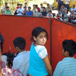 kids getting ready to perform a puppet show